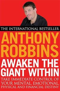Awaken the Giant Within by Anthony Robbins book cover about motivation