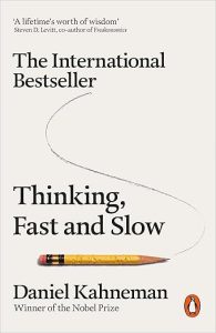 Thinking Fast and Slow by Daniel Kahneman book cover about decision making and psychology